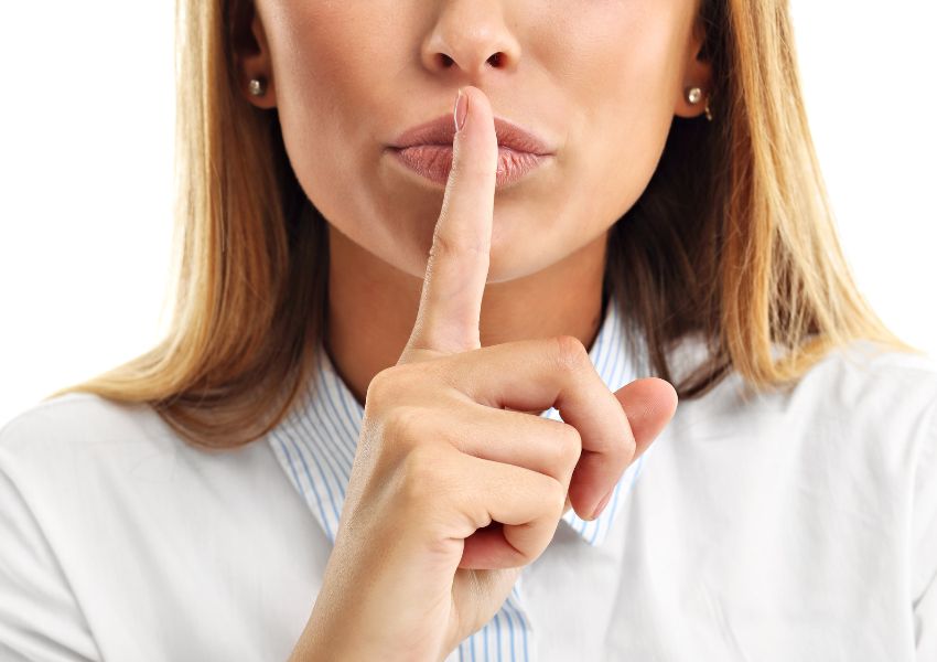 close-up-of-a-person-shushing-the-camera